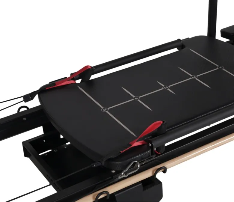 Pilates Reformer Machine met roterende handgrepen